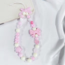 Chic Starry Bow Phone Charm
