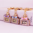 Ribbon Rhinestone Perfume Bottle Keychain